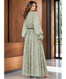 Sage green floral maxi dress, back view with flowing skirt