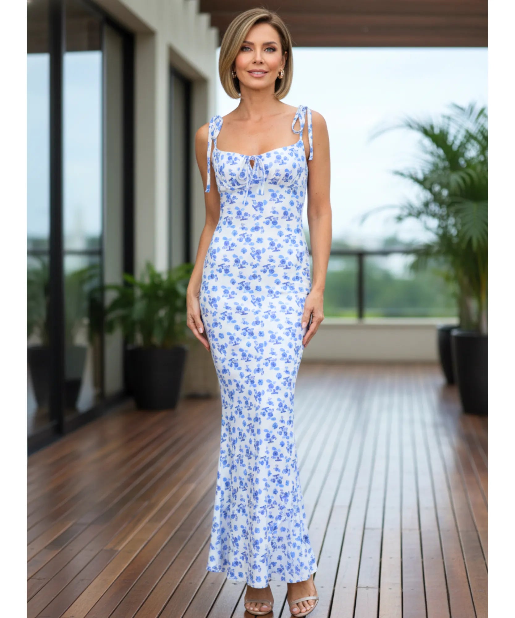 Women's floral mermaid maxi dress in light blue, front view