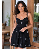 Women's Black Mini Dress with Floral Embroidery, styled look